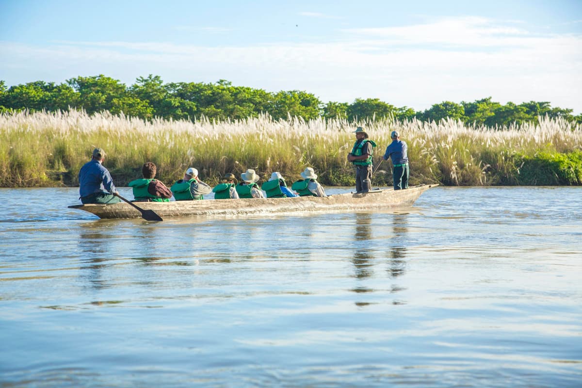 Chitwan Pokhara Tour - a dugout canoe on the Rapti River in Chitwan