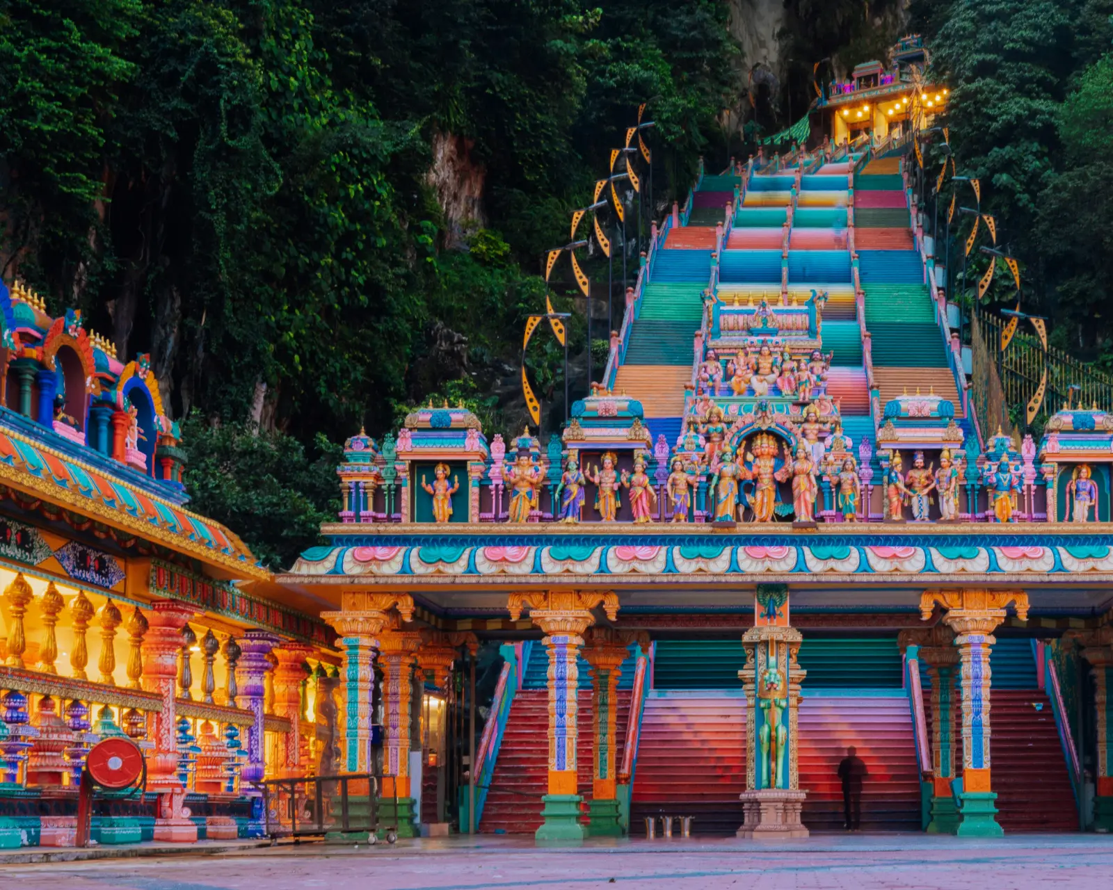 Close view of the colourful painted steps and gateway shrine at Batu Caves in Selangor