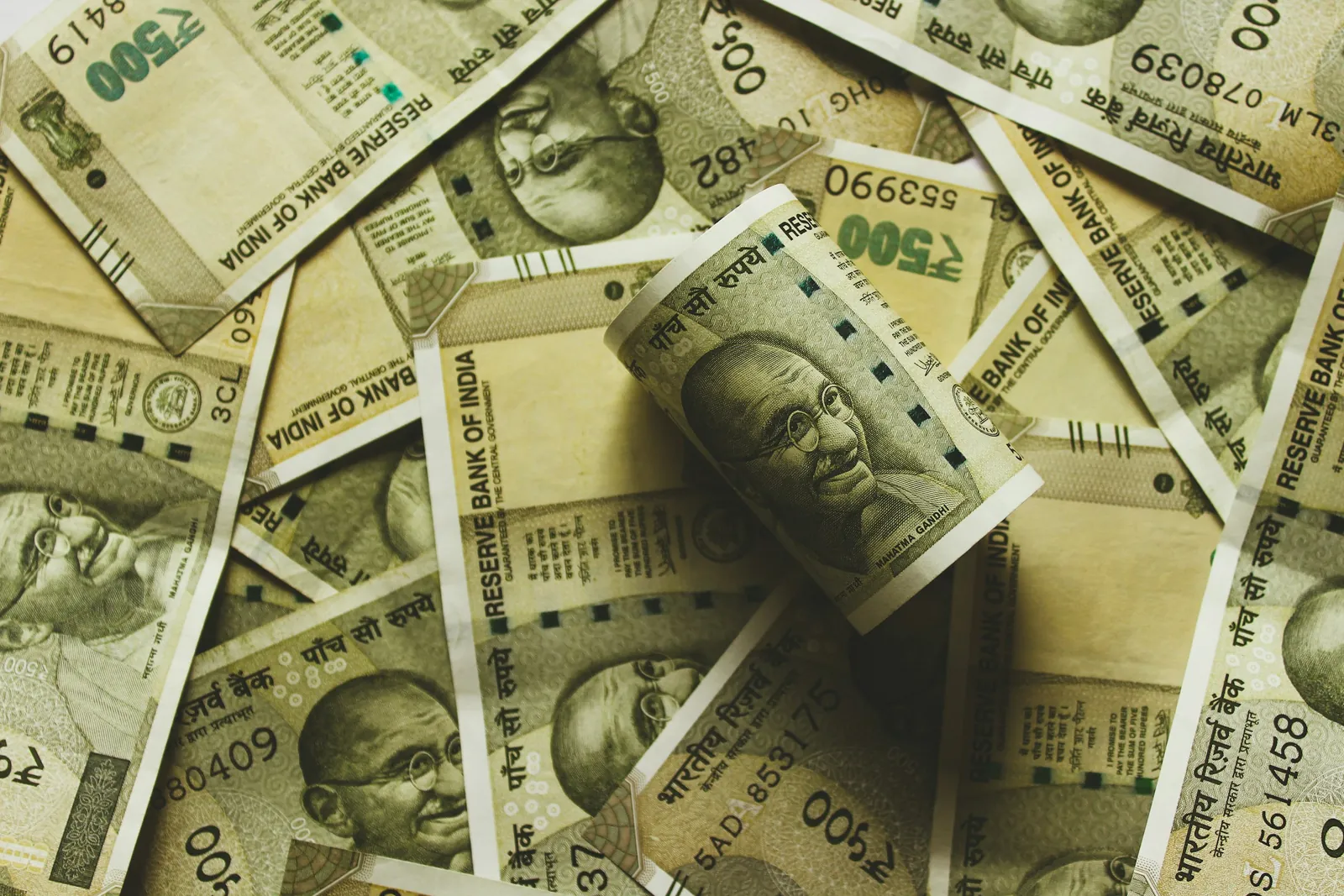 Scattered Indian five hundred rupee notes, the denomination Nepali travellers may carry to India