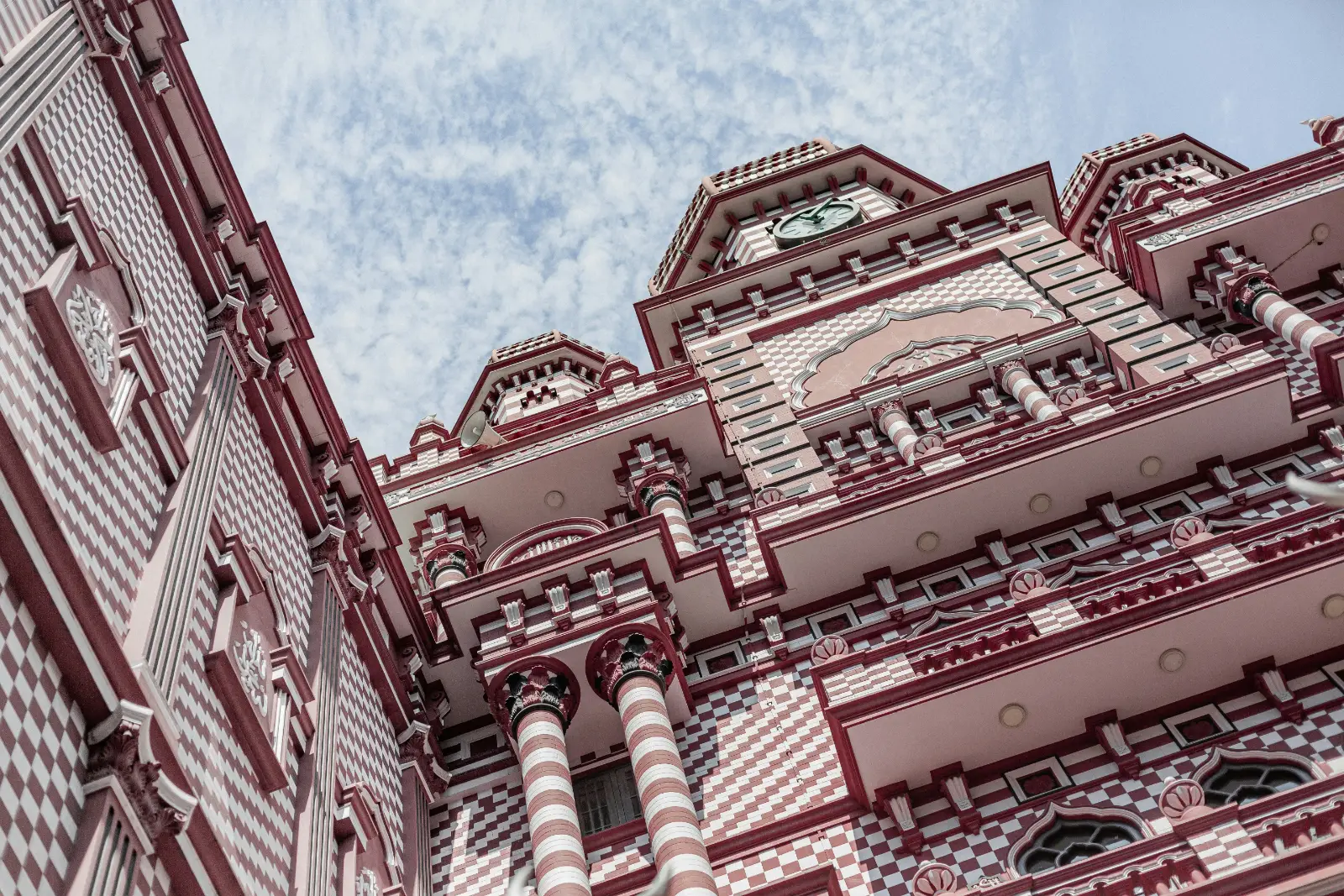 Red and white striped facade of Jami Ul Alfar Mosque in Pettah, Colombo