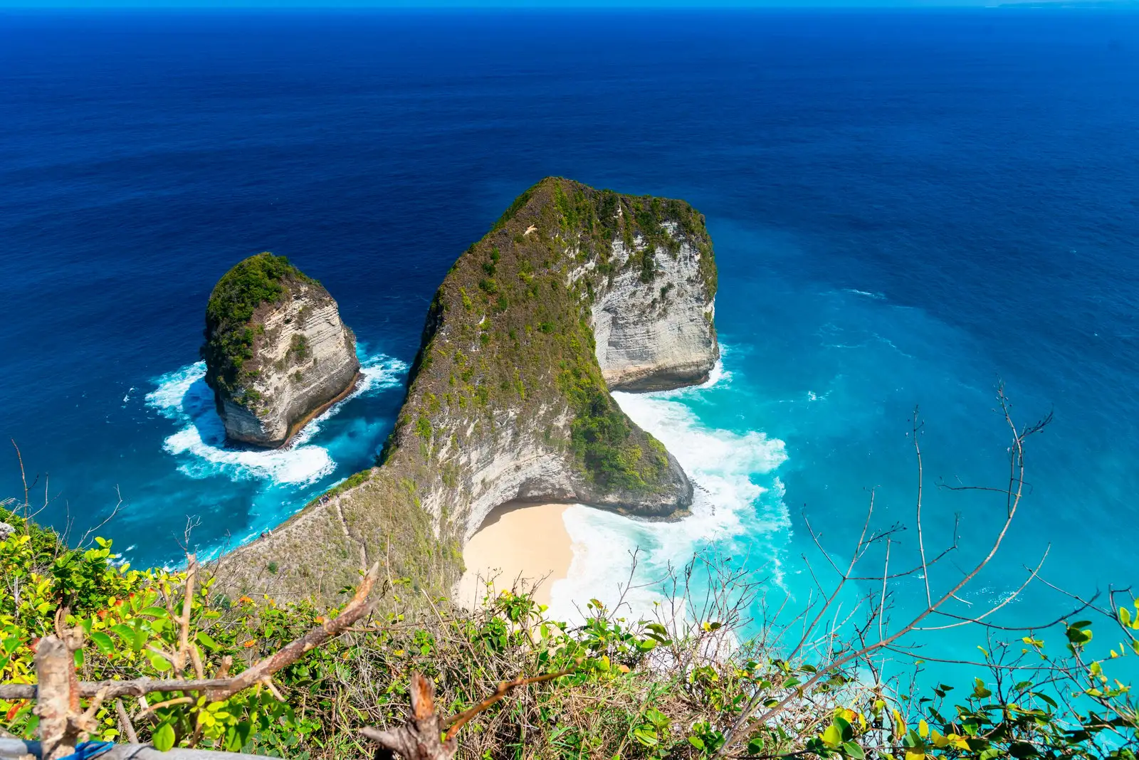 Kelingking Beach headland and turquoise water seen from the clifftop on Nusa Penida