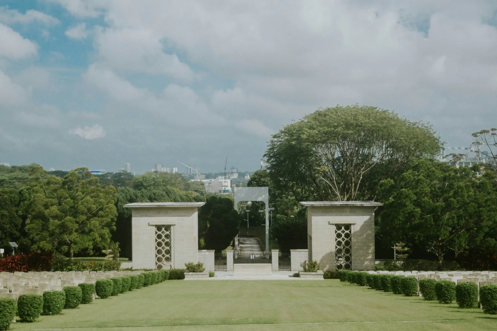 Memorial gateway and neat green lawns at the Kranji War Memorial in northern Singapore