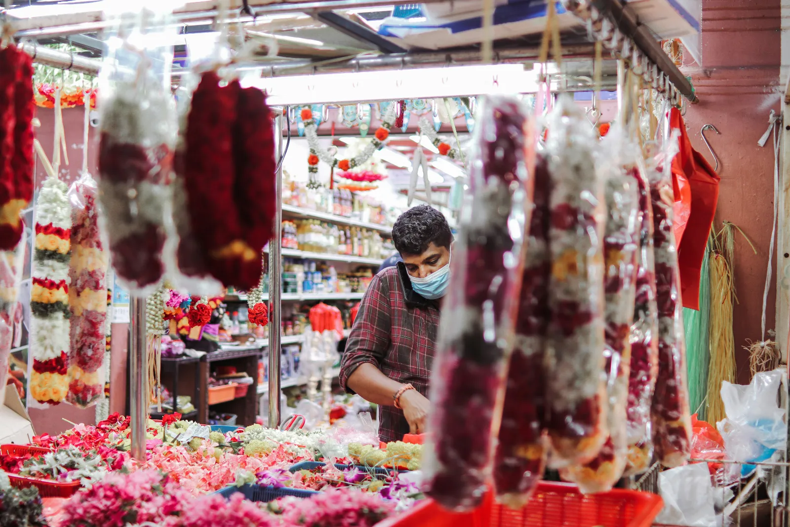 Jasmine and marigold flower garlands hanging at a shop in Little India, Singapore