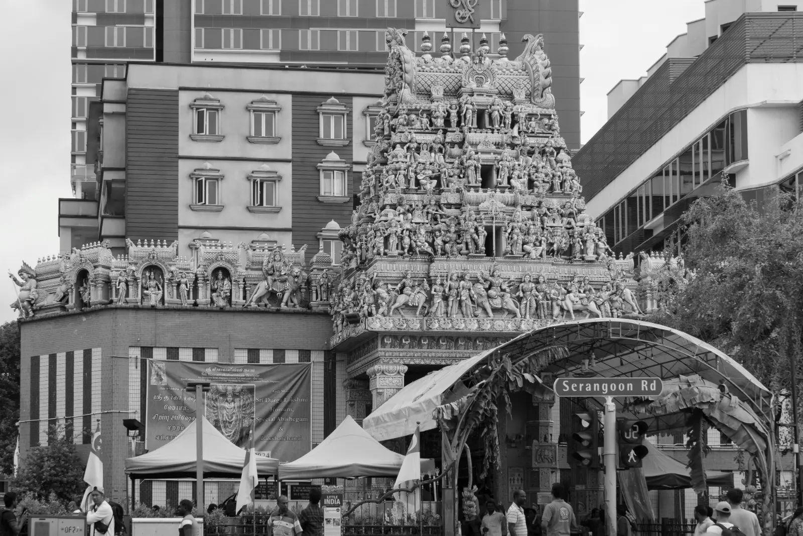 Black and white view of a sculpted Hindu temple gopuram in Little India, Singapore