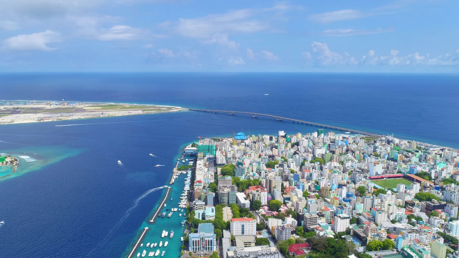 Aerial view of the densely built capital island of Malé surrounded by the sea