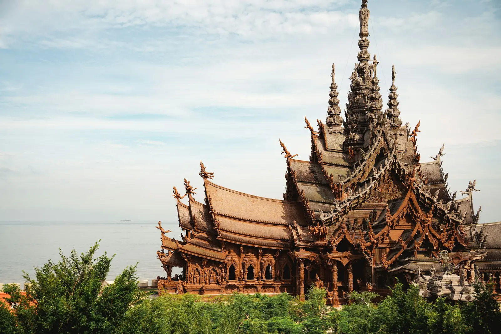 Carved wooden spires of the Sanctuary of Truth on the seafront in Naklua, Pattaya