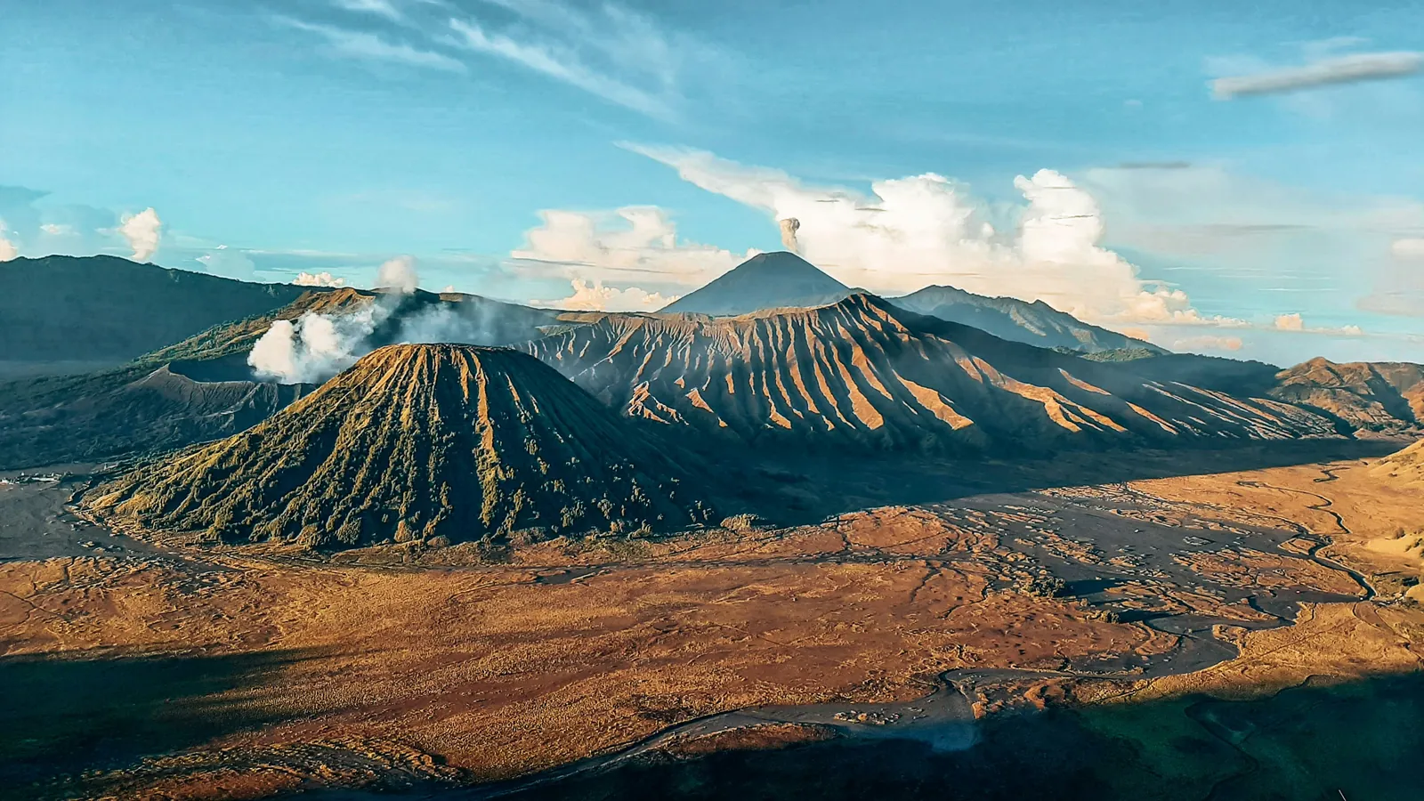 Aerial view of the Tengger caldera with Mount Bromo, Batok and the Sea of Sand in East Java